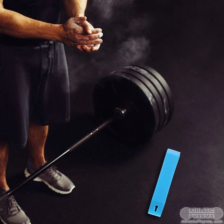 Пауэрлифтер у штанги